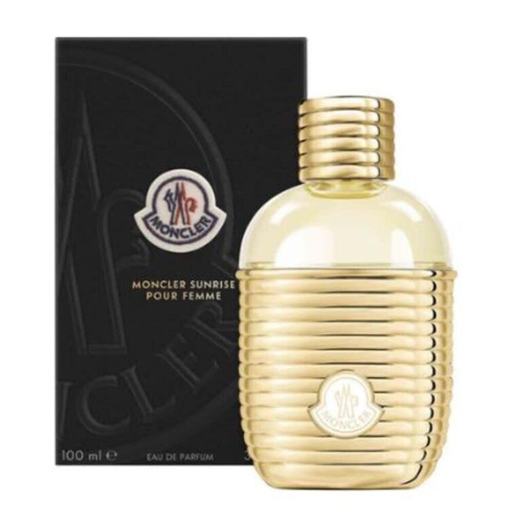 Flacon et emballage Moncler Sunrise pour Femme Eau de Parfum. Flacon doré côtelé avec logo Moncler.