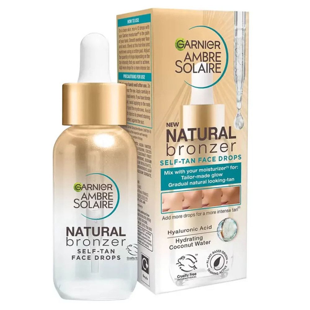 Garnier Ambre Solaire Natural Bronzer gouttes autobronzantes visage en flacon verre avec pipette. Boîte en carton avec informations produit.