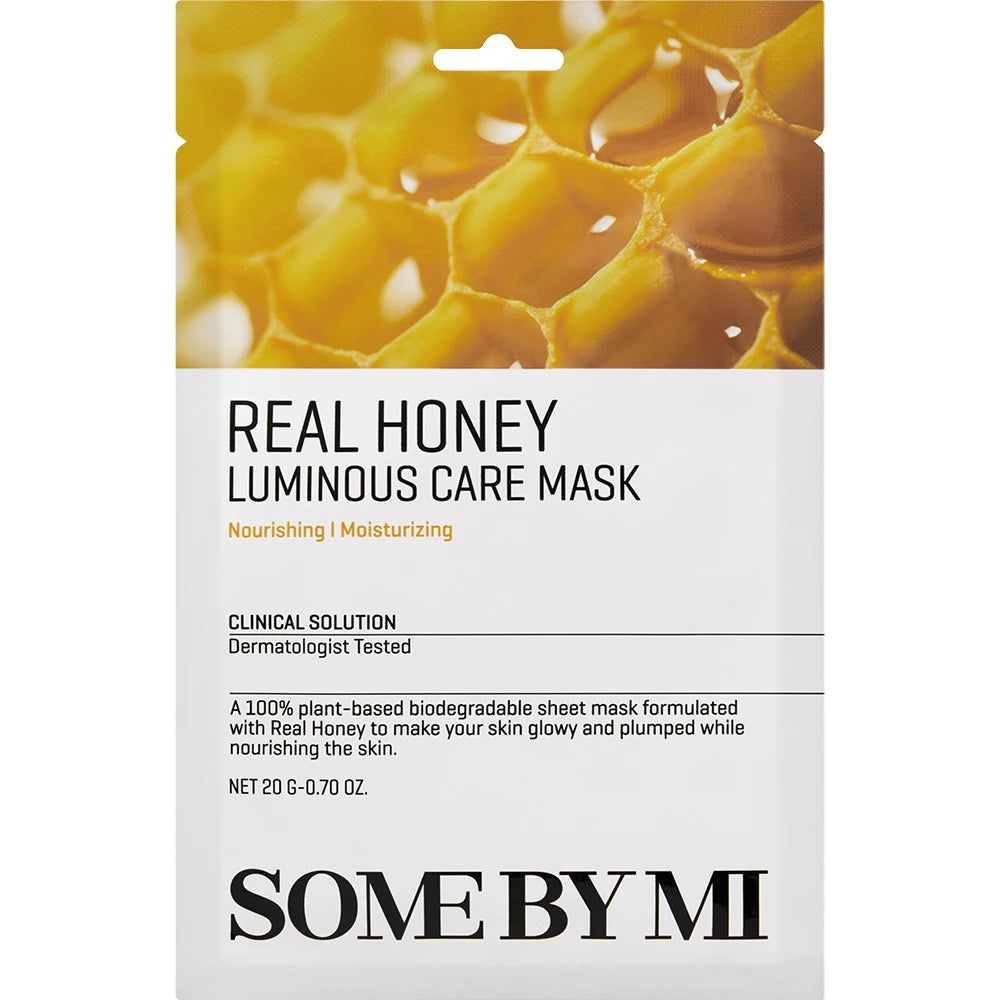 Emballage SOME BY MI Real Honey Luminous Care Mask. Design en nid d'abeilles, texte et logo.