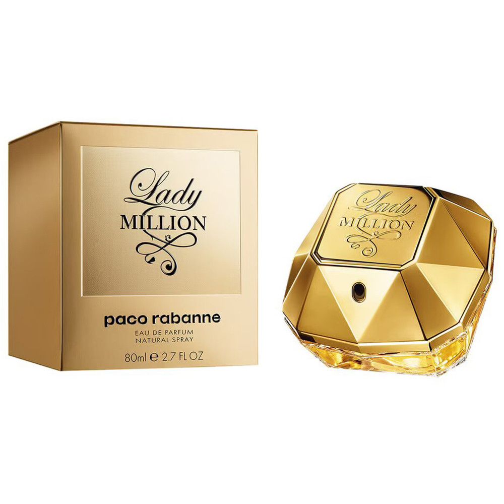 Gouden fles en doos. Opschrift "Lady MILLION" en "paco rabanne". Fles in diamantvorm.