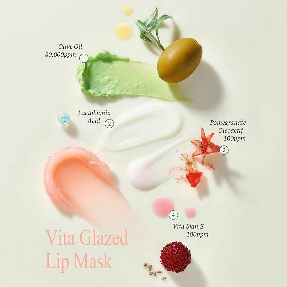 Ingrédients : Huile d'olive, acide lactobionique, grenade, Vitaskin E. Texte : « Vita Glazed Lip Mask ».