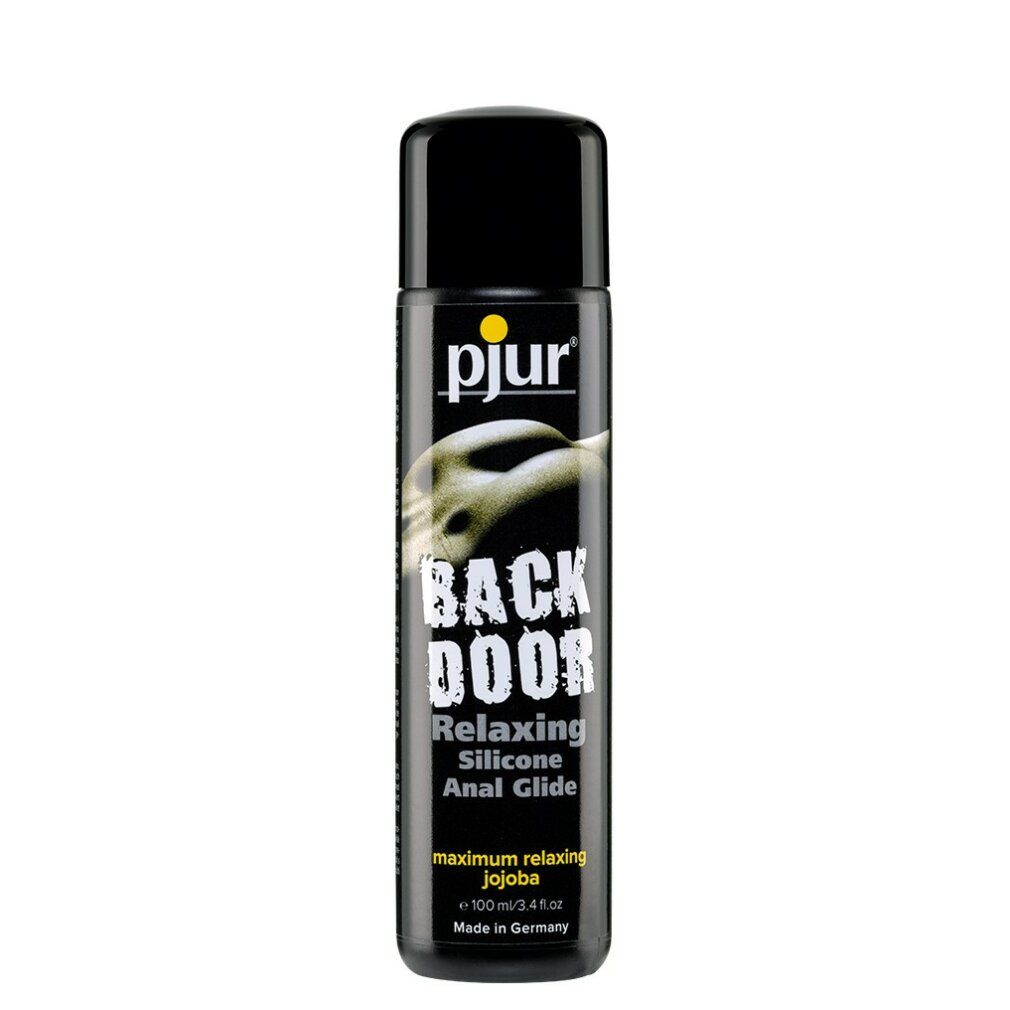 Zwarte fles met geel logo. Opschrift: BACK DOOR Relaxing Silicone Anal Glide. Met jojoba. 100 ml. Gemaakt in Duitsland.