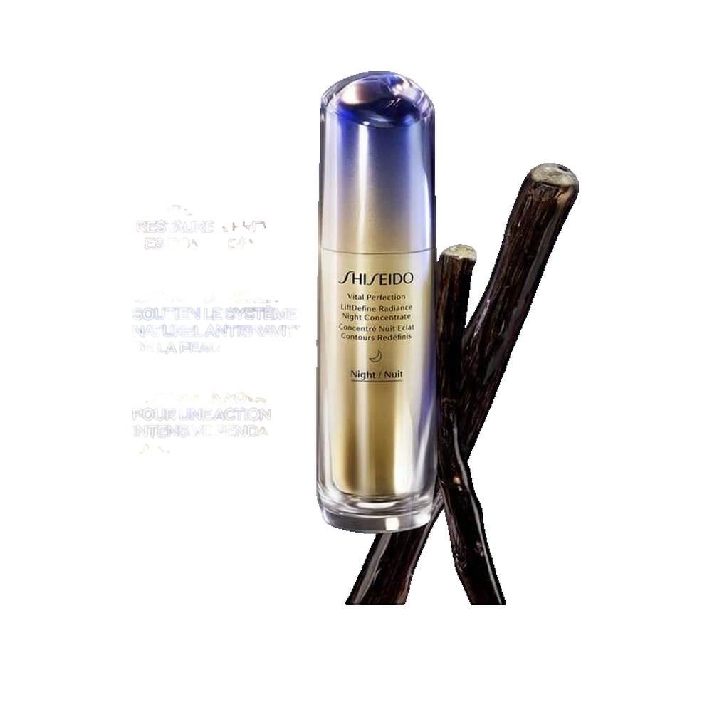 Cilindrische fles met paars-gouden kleurverloop. Opschrift: Shiseido Vital Perfection LiftDefine Radiance Night Concentrate. Met vanillestokjes.
