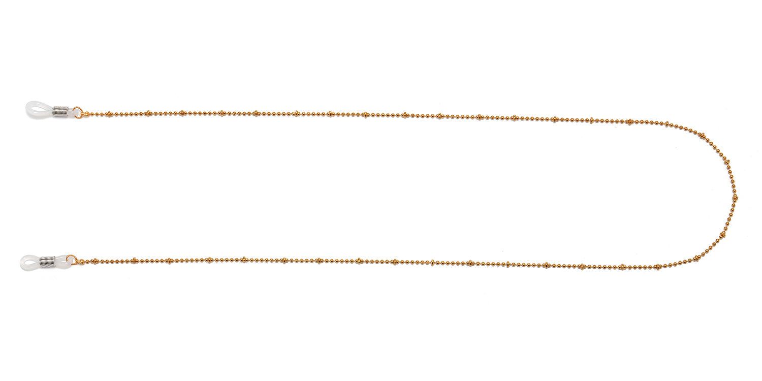 Gouden brillenkoord met bolletjes. Transparante siliconen lussen aan beide uiteinden voor de pootjes.