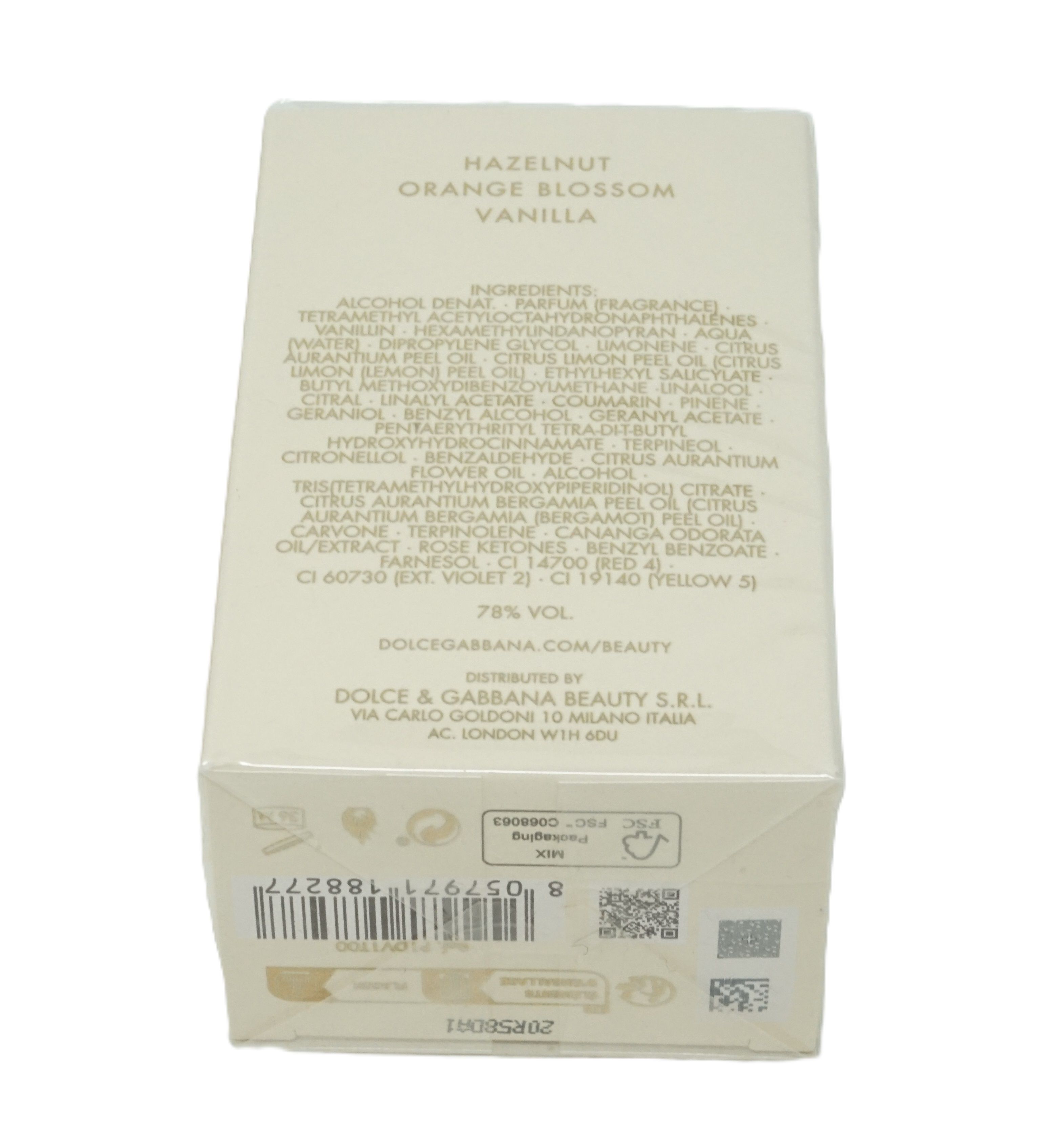 Parfumverpakking. Opschrift: Hazelnut, Orange Blossom, Vanilla. Ingrediënten en informatie. Dolce & Gabbana Beauty.