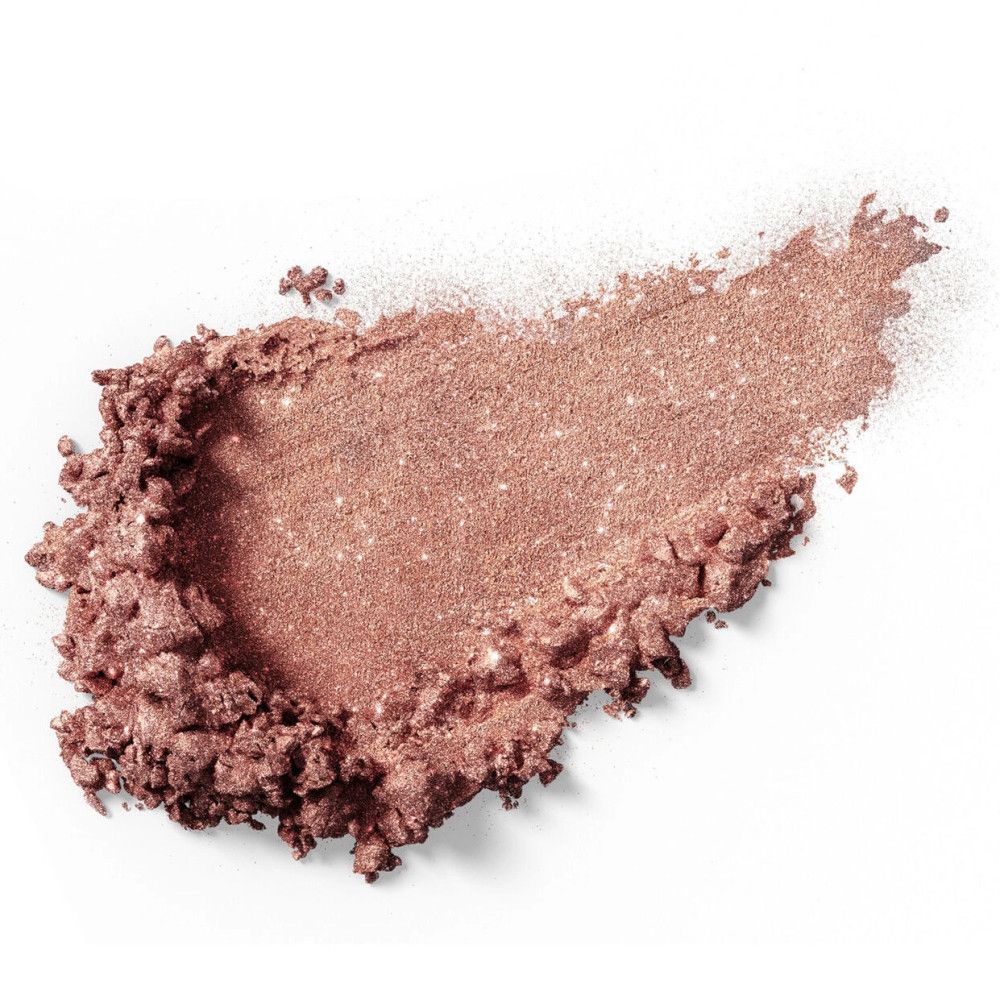 Roze-beige oogschaduwveeg op witte achtergrond. De textuur is licht glanzend en poederachtig.