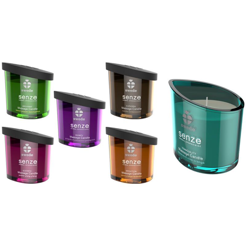 Zes massagekaarsen in glazen potten met schuine bovenrand en zwart deksel. Vijf kleinere kaarsen in diverse kleuren, één grotere in turquoise.
