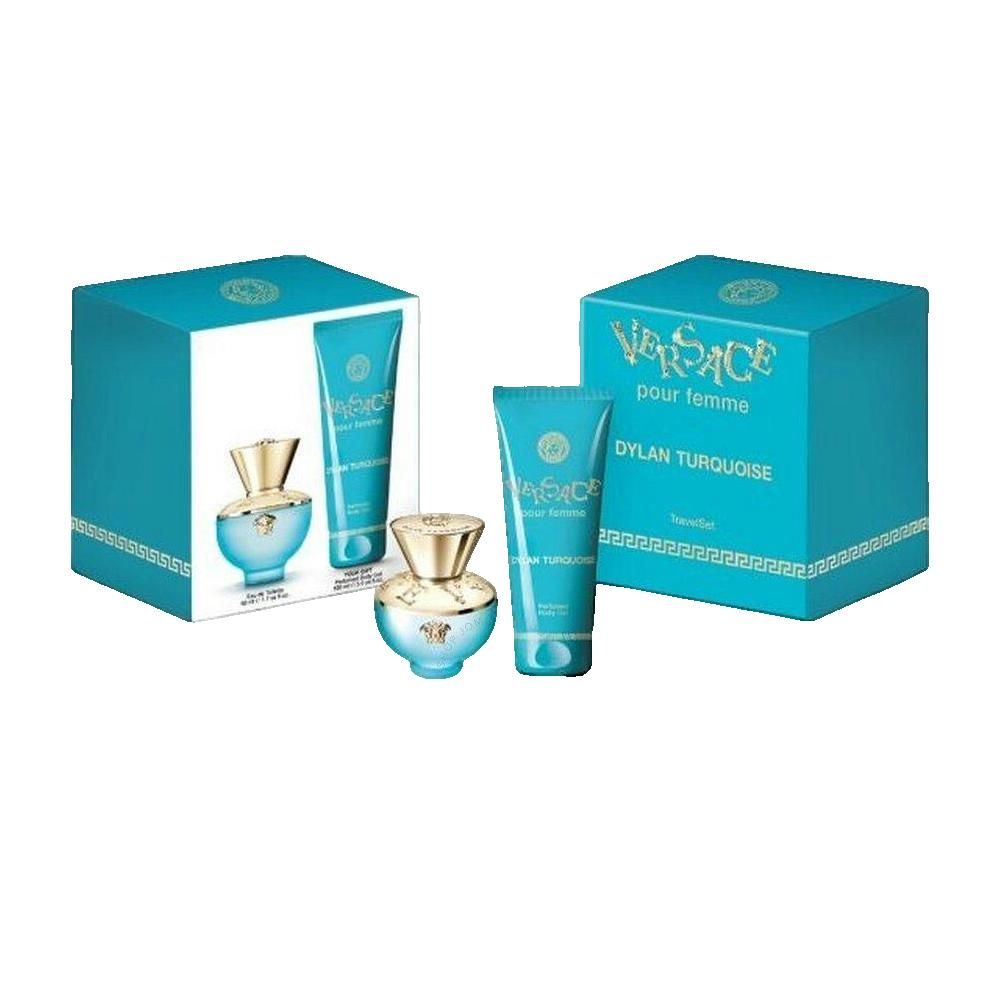 Twee turquoise geschenkverpakkingen Versace. Parfum en bodygel. Opschrift Versace.