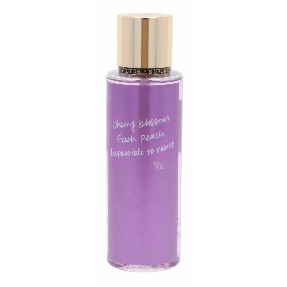 Flacon violet avec bouchon doré. Inscription: cherry blossom, Fresh peach. Vaporisateur.