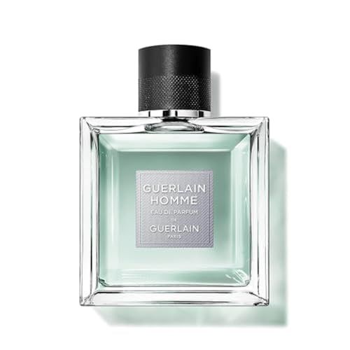 Flacon carré en verre avec bouchon noir. Inscription : Guerlain Homme, Eau de Parfum, Guerlain.
