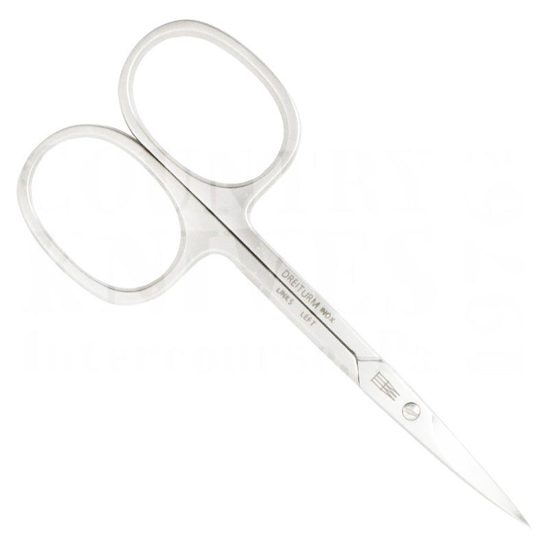 Huid schaar voor linkshandigen. Zilverkleurig metaal. Handgrepen met ovale openingen. Scherpe bladen. Opschrift: DREITURM INOX LINKS LEFT.