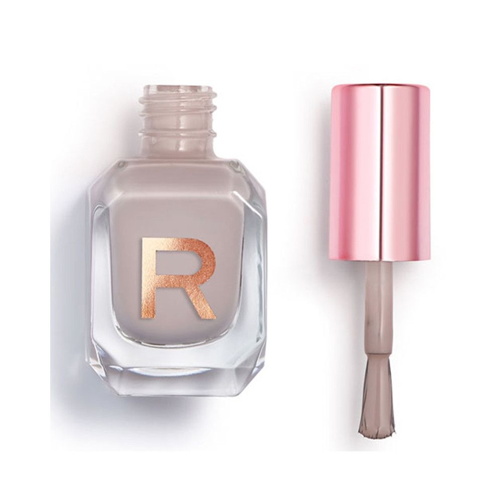 Nagellakfles met applicator en roségouden dop. De inhoud van de fles is lichtgrijs.