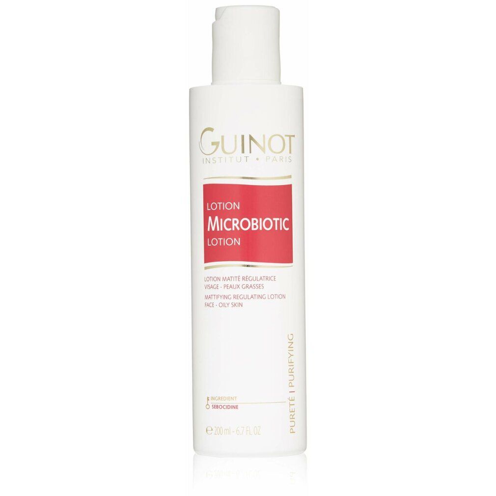 Witte fles Guinot Microbiotic. Rood etiket: Lotion Microbiotic, vette huid. 200ml. Witte dop.