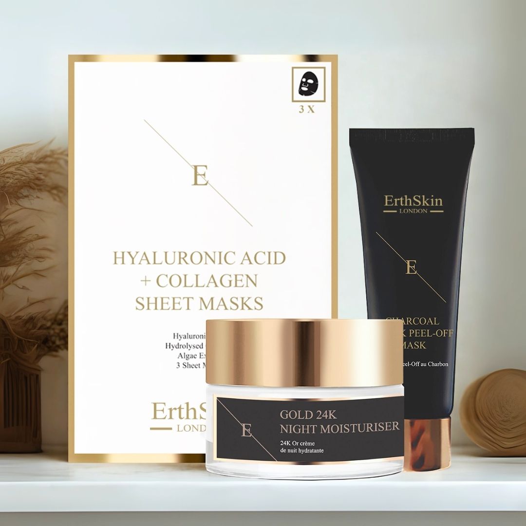 Set met nachtcrème, gezichtsmasker en collageenmaskers. Gouden pot, zwarte tube en verpakking. ErthSkin London. Op plank.