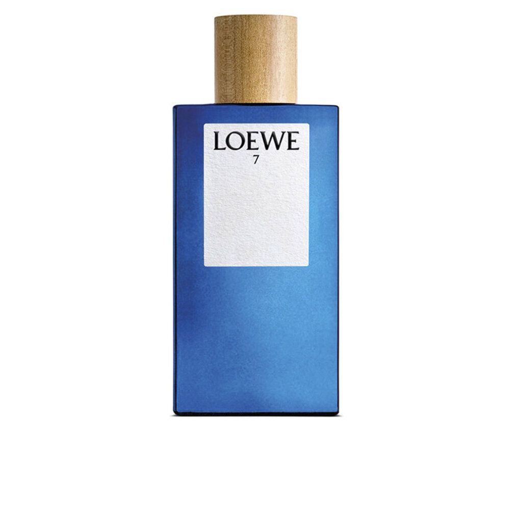 Blauwe parfumfles met houten dop. Opschrift: LOEWE 7. Wit etiket.