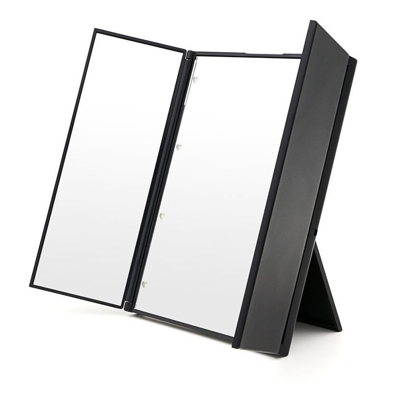 Miroir cosmétique noir pliable à trois volets avec éclairage LED. Deux surfaces de miroir sont visibles.