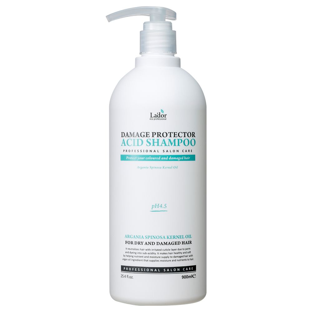 Flacon pompe blanc avec étiquette LADOR Damage Protector Acid Shampoo, pH 4.5.