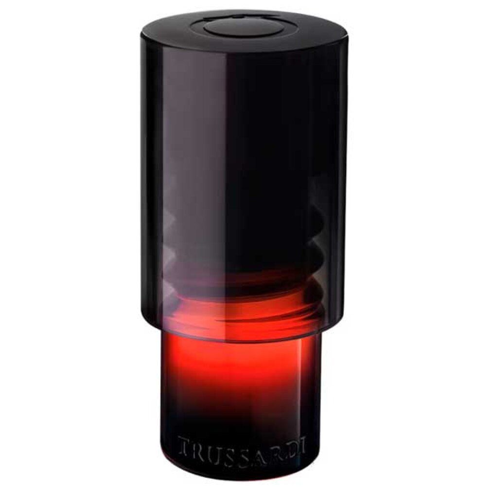 Flacon noir dégradé rouge. Inscription Trussardi en bas. Forme cylindrique avec partie centrale cannelée.