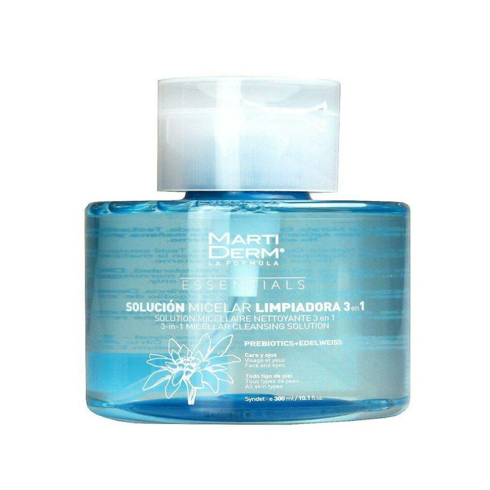 Blauwe transparante fles met witte dop. Opschrift: Marti Derm Essentials, Solución Micelar 3 en 1. Met pomp.