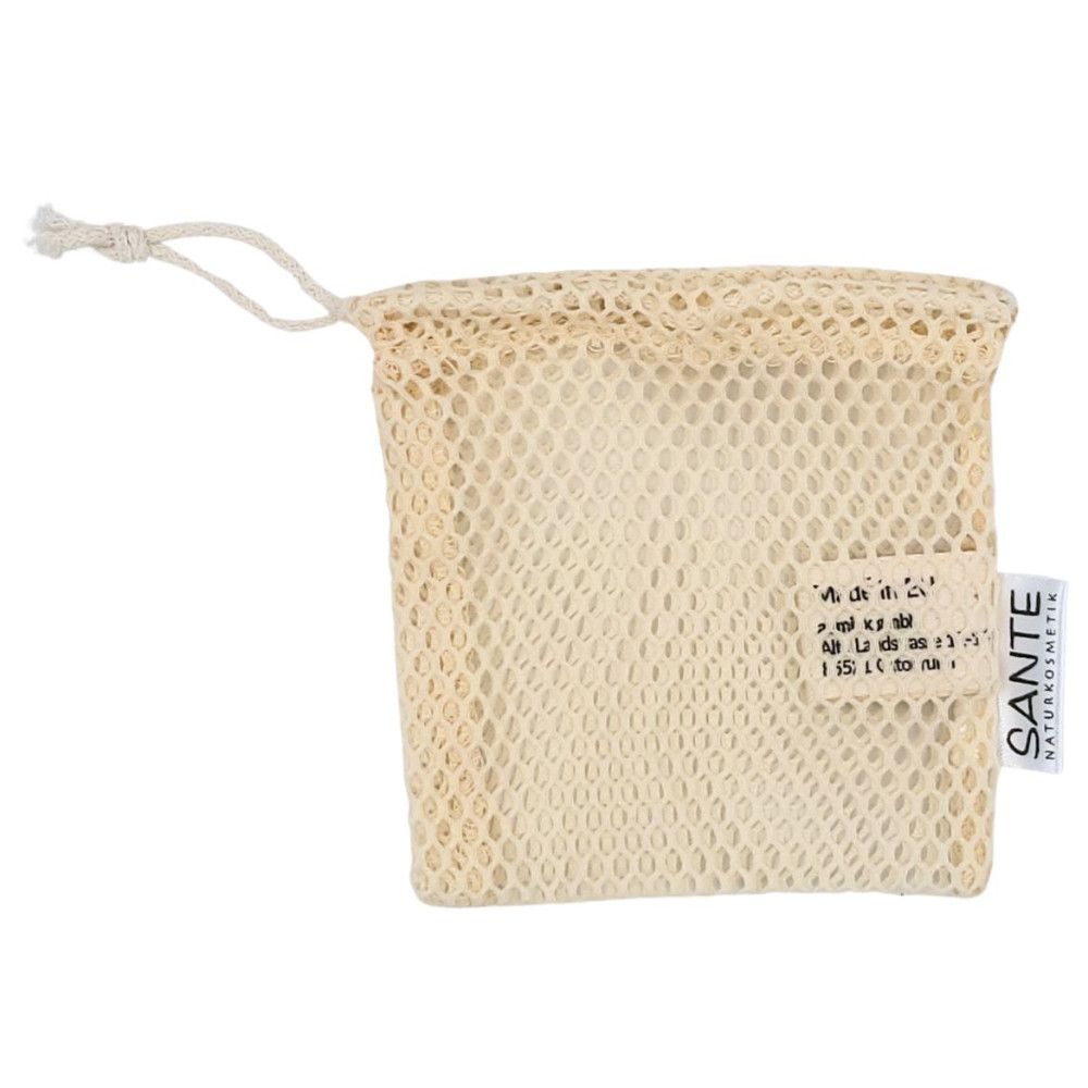 Pochette à savon beige en filet avec cordon de serrage. Logo Sante sur l'étiquette.