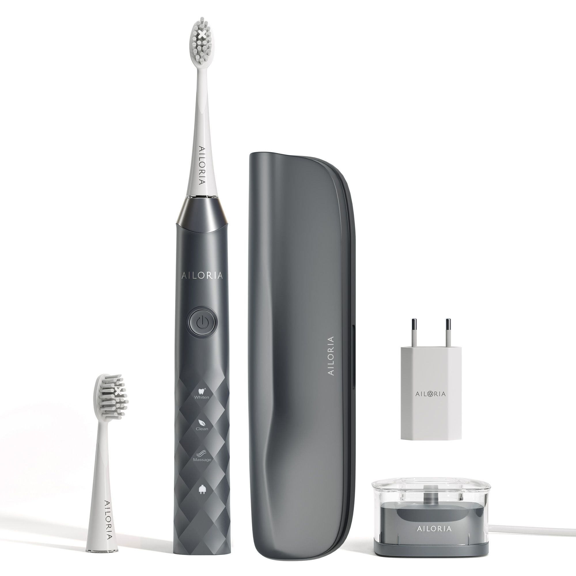 Brosse à dents électrique avec accessoires : socle de chargement, étui de voyage, tête de rechange et adaptateur secteur. Couleur grise.