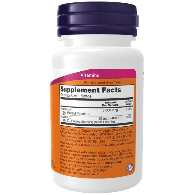 Flacon blanc, bouchon violet. Étiquette avec informations nutritionnelles, vitamines A et D. Marque : NOW Foods.