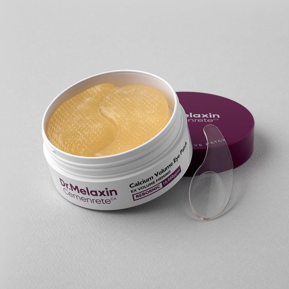 Dr. Melaxin Cemenrete Calcium Volume Eye Patch pot met gele oogpads en spatel.