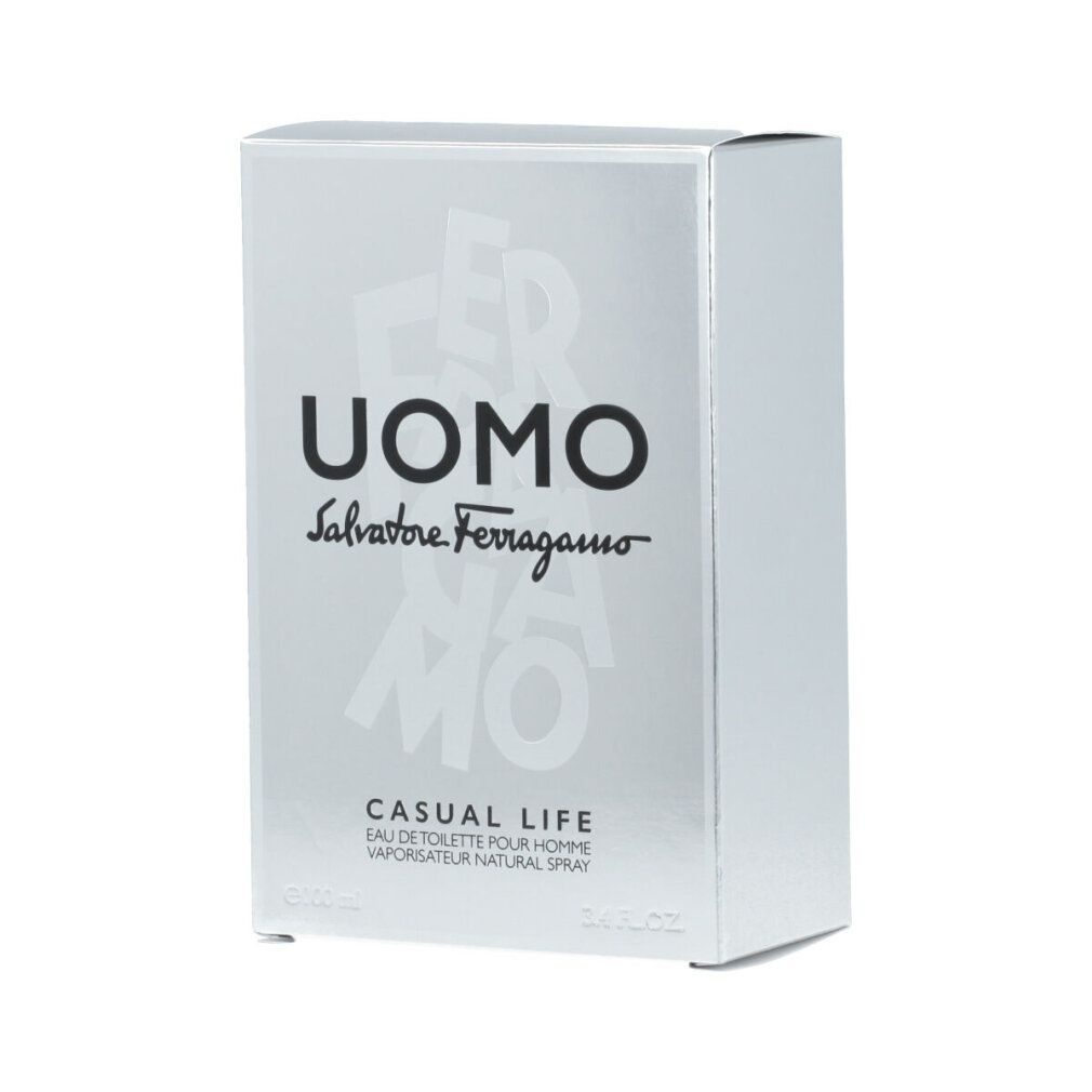 Grijze verpakking met opschrift UOMO, daaronder Salvatore Ferragamo en Casual Life. Eau de Toilette Spray.