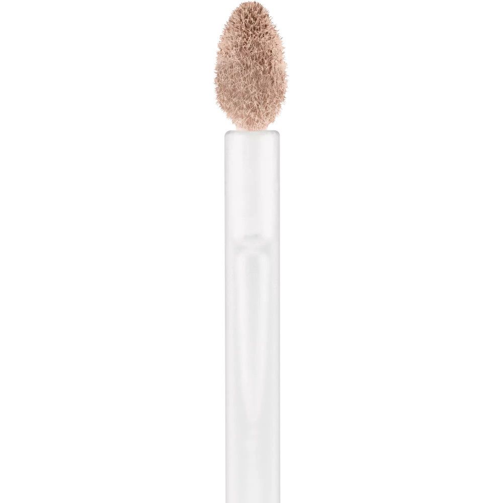 Applicateur du correcteur mat Essence Camouflage+. Embout beige, tige blanche.