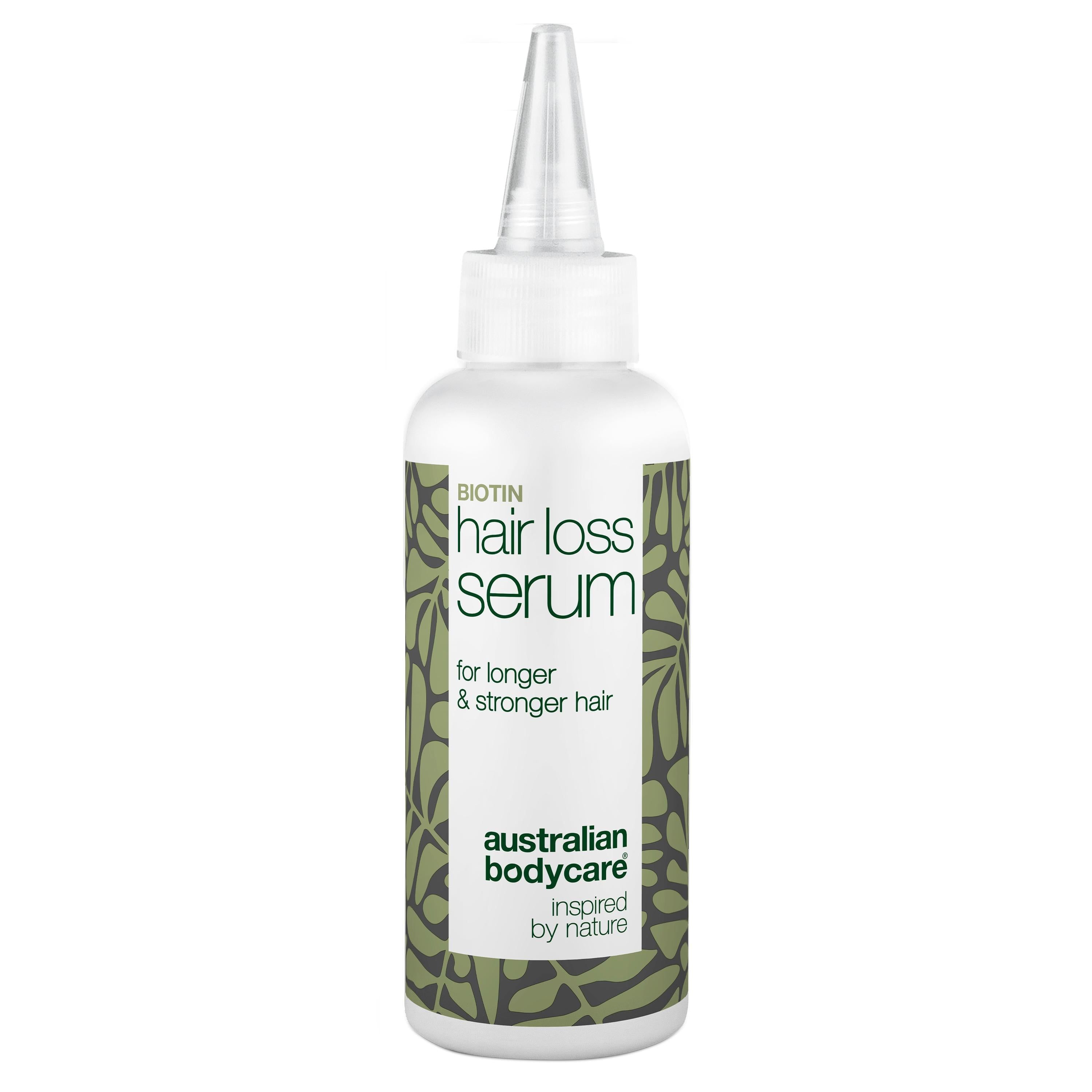 Serumflesje met opschrift "Hair Loss Serum". Wit flesje met applicator. Merk: Australian Bodycare.