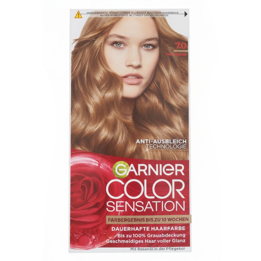 Garnier Color Sensation haarverf. Verpakking met afbeelding van een vrouw met blond haar. Productinformatie en logo.