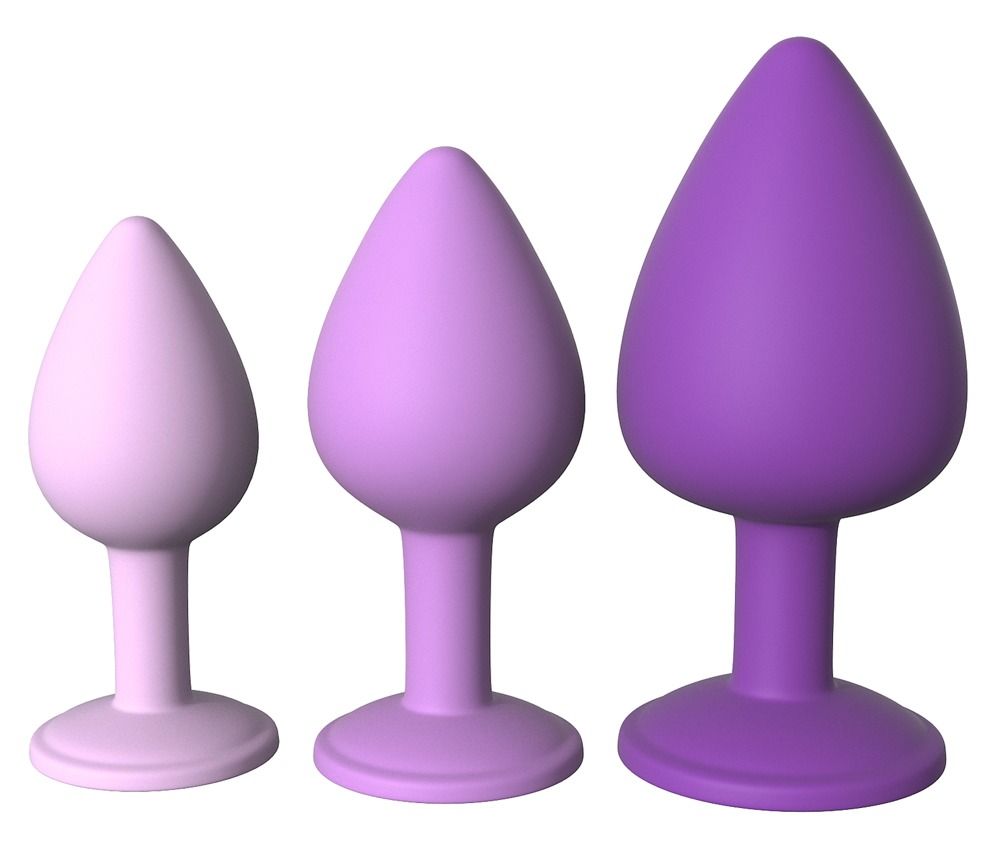 Trois plugs anaux violets, de petit à grand, avec une base large.