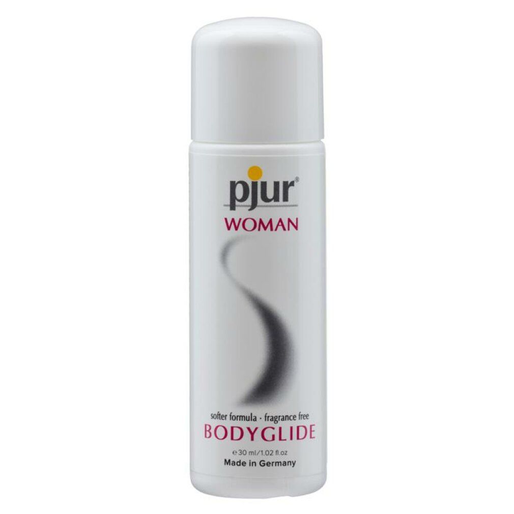 pjur BODYGLIDE, lubrifiant silicone. Flacon blanc, logo jaune. Ligne noire incurvée. Texte: softer formula fragrance free, 30 ml/1.02 fl oz.