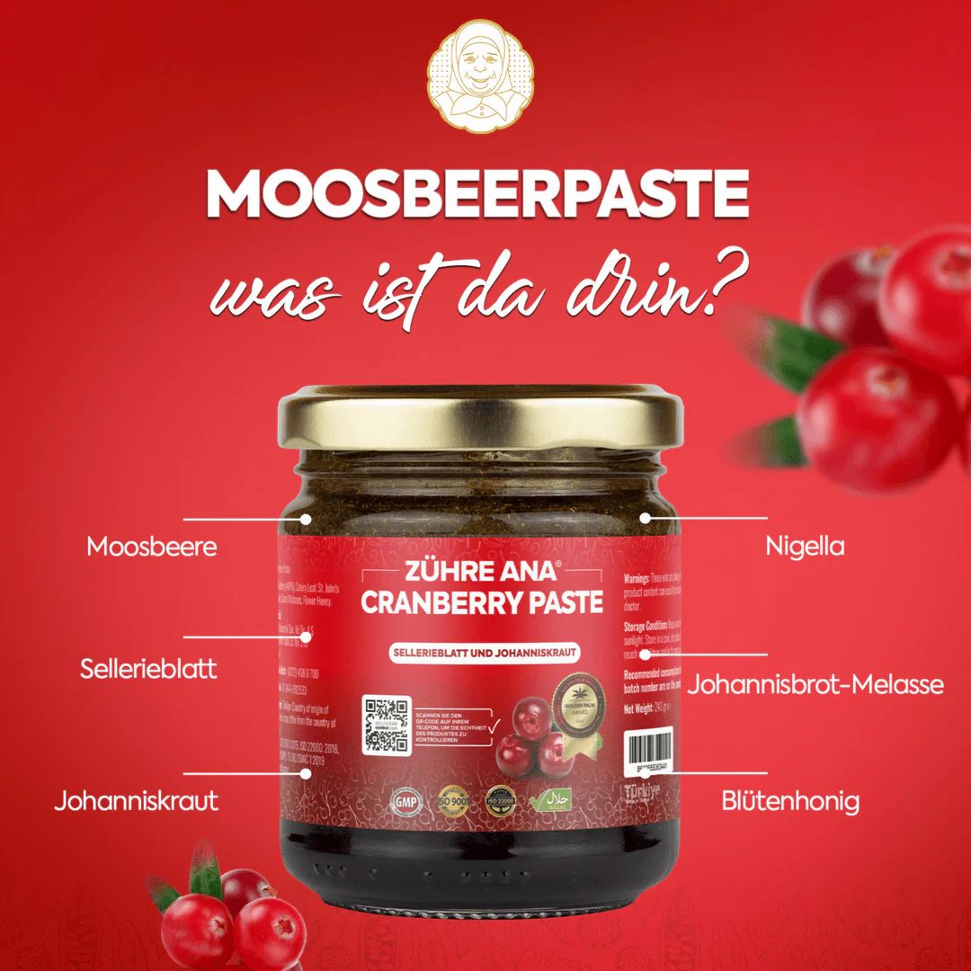 Bocal de pâte de canneberge Zühre Ana avec liste d'ingrédients et canneberges.