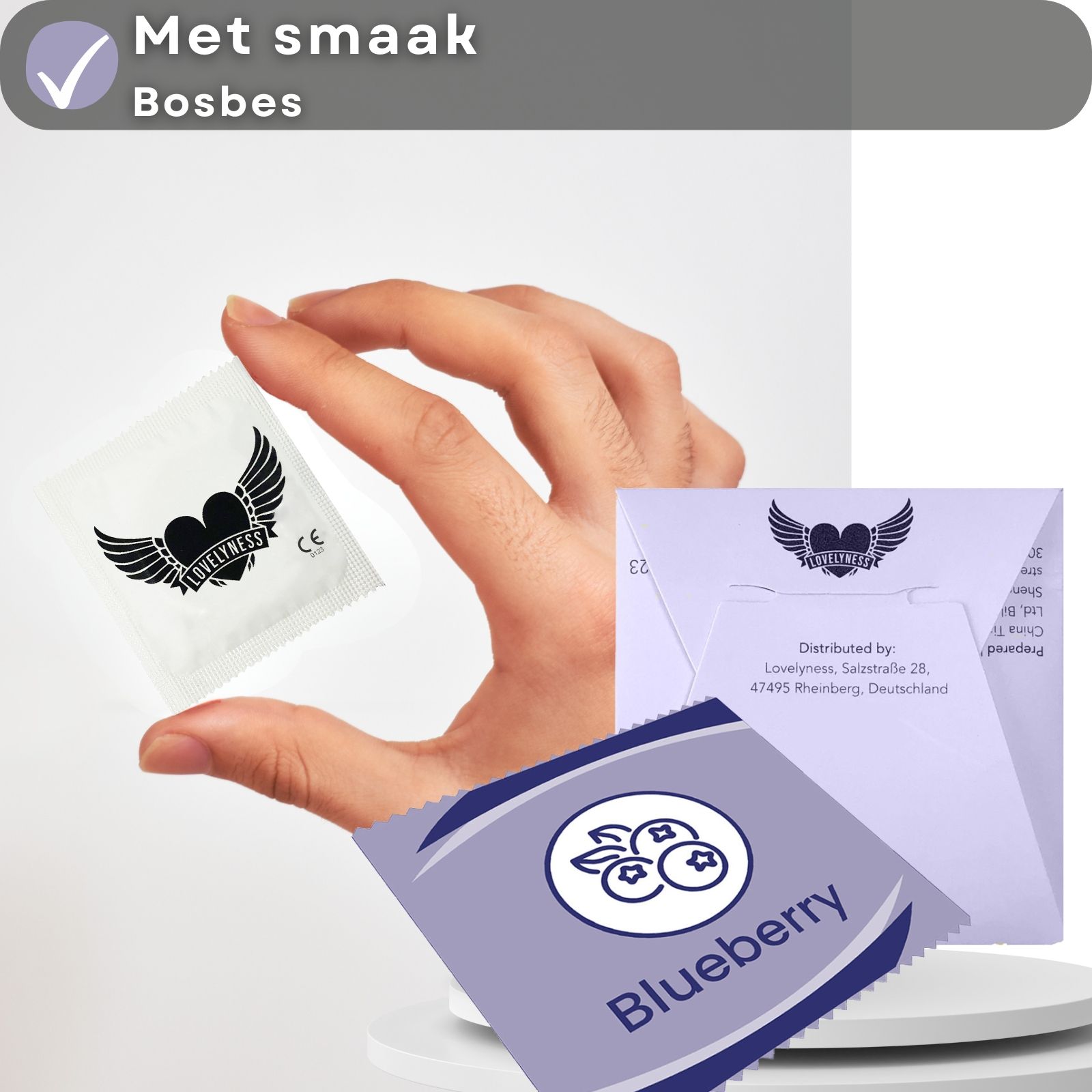 Condooms met bosbessmaak, lengte 190 mm, nominale breedte 52 mm. Extra glijmiddel.