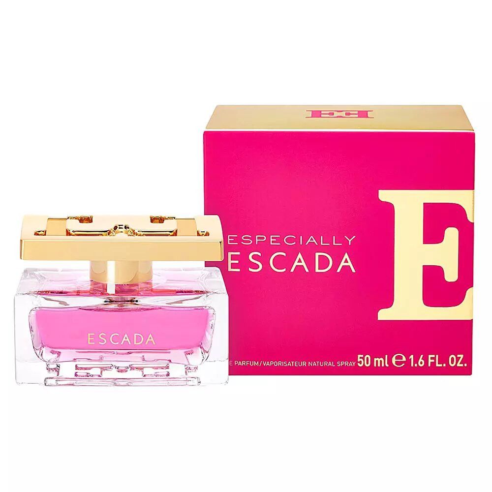 Flacon de parfum et emballage. Flacon en verre avec bouchon doré. Liquide rose. Emballage rose avec logo doré.