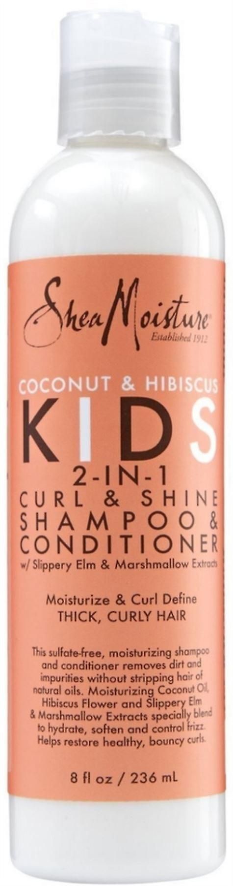 Fles Shea Moisture Kids shampoo & conditioner. Oranje opdruk met productnaam en ingrediënten. Witte dop.