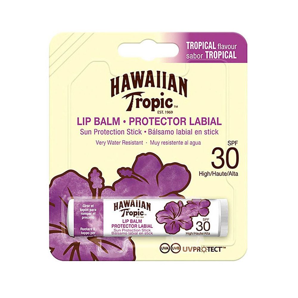 Stick de protection solaire pour les lèvres, emballé. Marque: Hawaiian Tropic. SPF 30. Motif floral d'hibiscus. Texte: Lip Balm, Protector Labial.