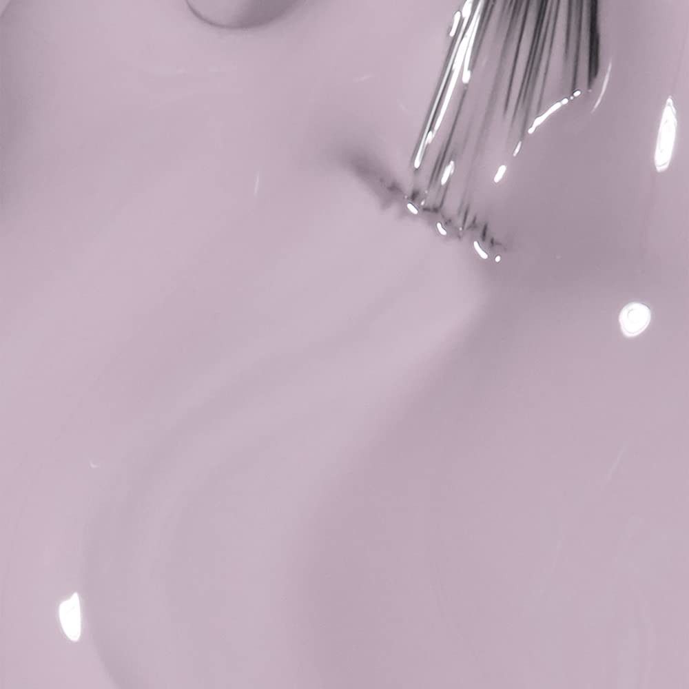 Lichtpaarse nagellak met penseel. Close-up, glanzend oppervlak.