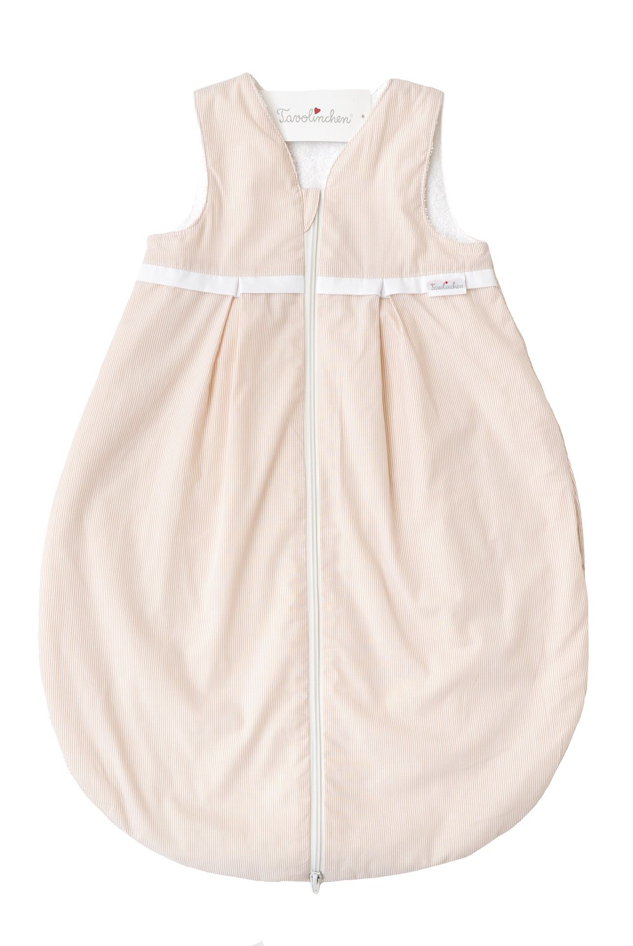 Beige slaapzak met rits en witte bies. Merk Tavolinchen zichtbaar.
