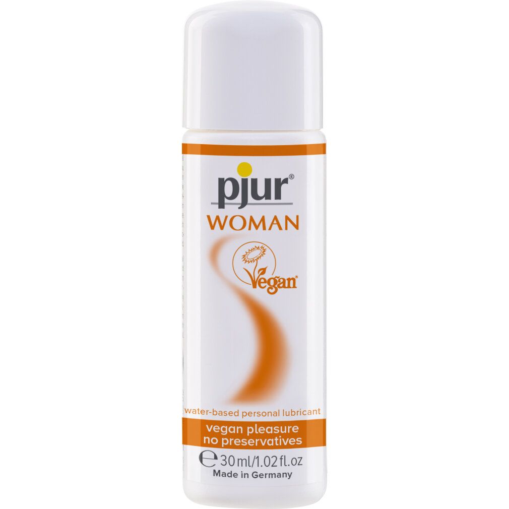 Flacon blanc avec design orange. Inscription: pjur WOMAN Vegan, lubrifiant personnel à base d'eau. Vegan pleasure no preservatives. 30 ml/1.02 fl oz.