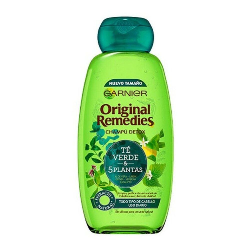 Groene shampoo fles met groene dop. Opschrift: Garnier Original Remedies Champú Detox. Bevat Té Verde & 5 plantas.