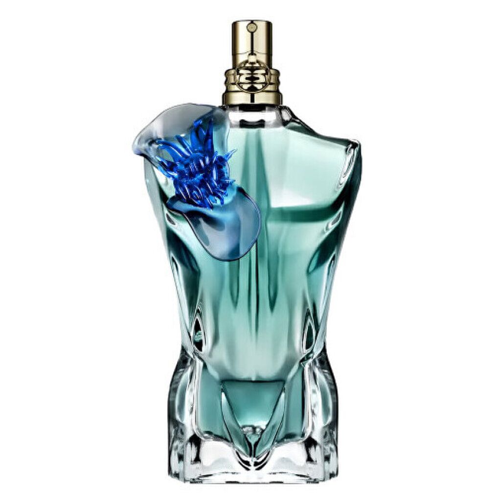 Flacon turquoise en forme de torse avec ornement floral bleu. Tête de pulvérisation dorée.