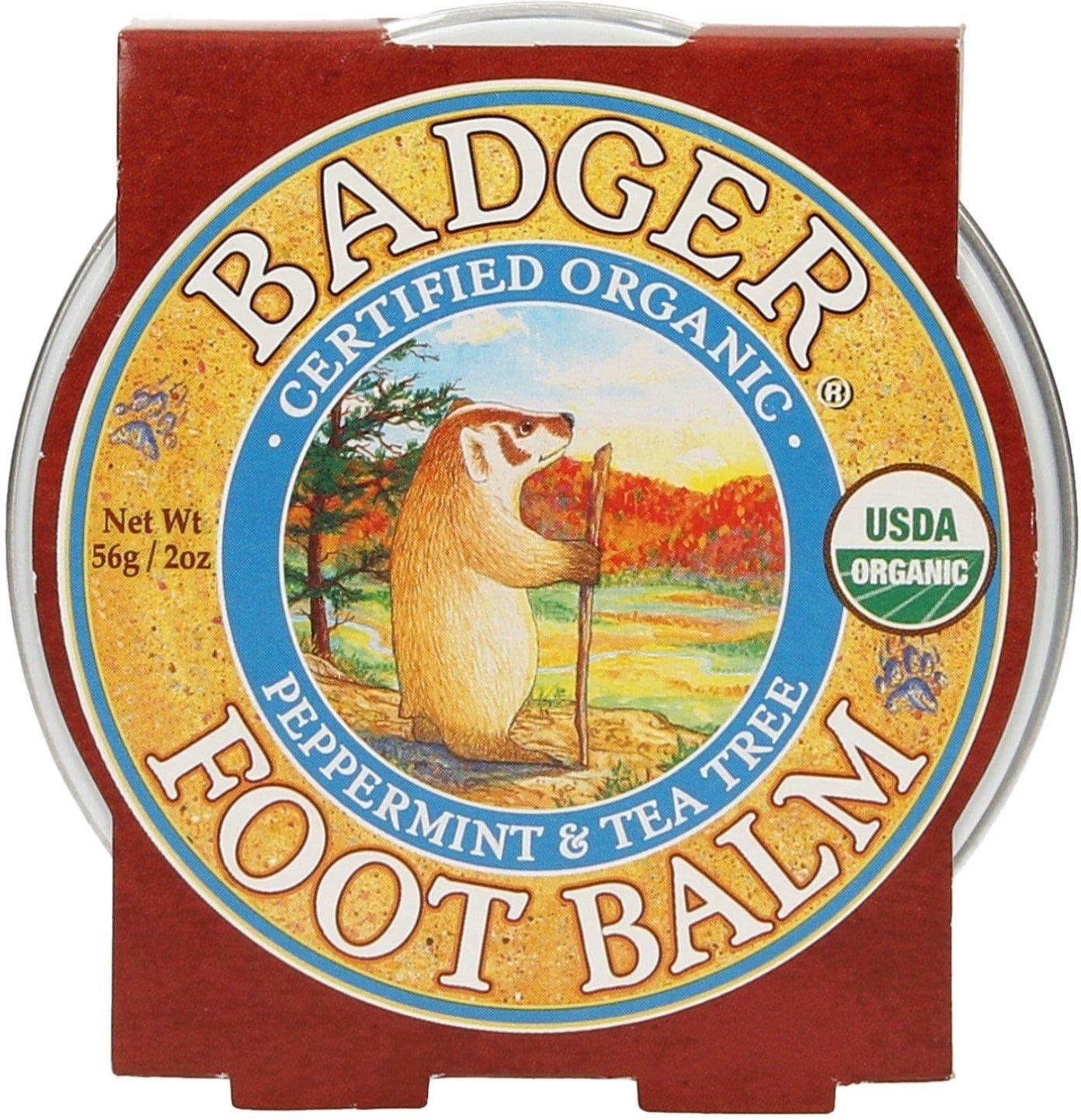Ronde pot met bruin deksel. Label met "BADGER FOOT BALM". Illustratie van een das. USDA Organic keurmerk.