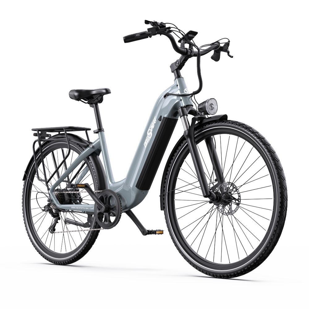 Grijze e-bike met zwarte banden en bagagedrager. Koplamp en batterij zichtbaar.