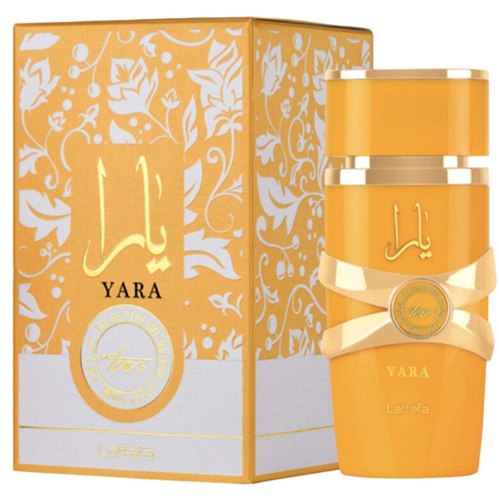 Flacon et boîte de parfum jaunes avec des accents dorés. Caractères arabes et logo de la marque visibles.