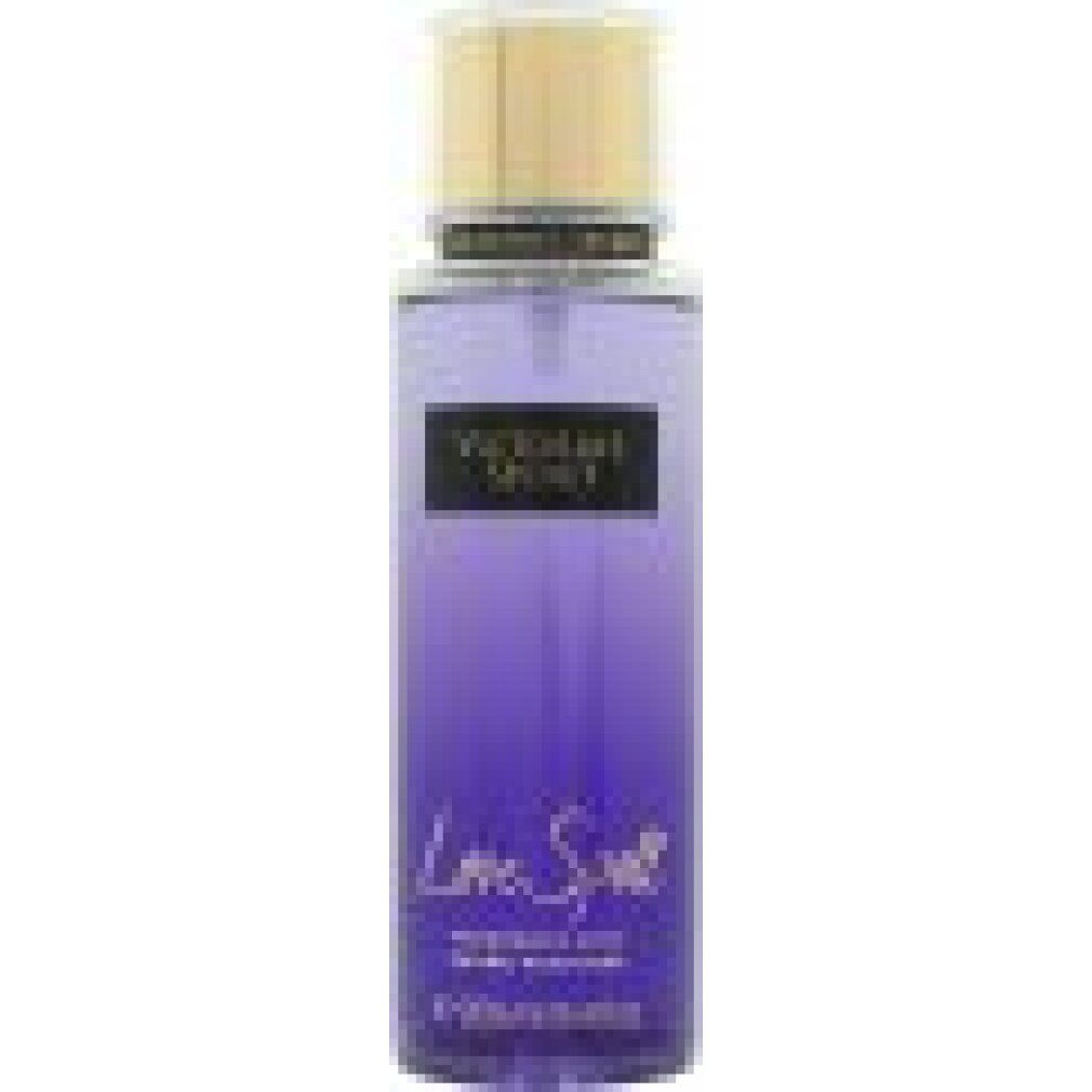 Brume corporelle Victoria's Secret Love Spell, bouteille violette avec bouchon doré et étiquette noire.