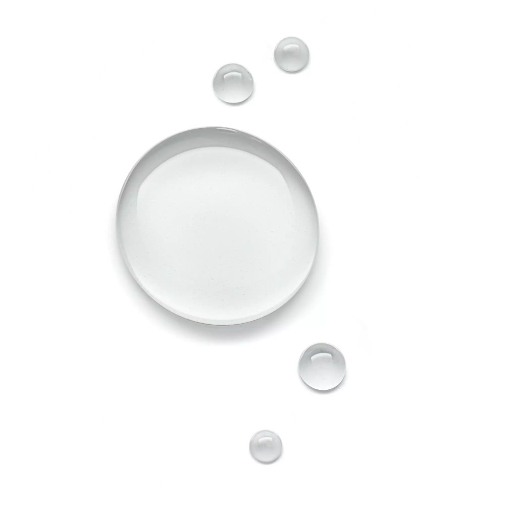 Vijf heldere, ronde druppels op witte achtergrond. De grootste in het midden, de andere kleiner eromheen.