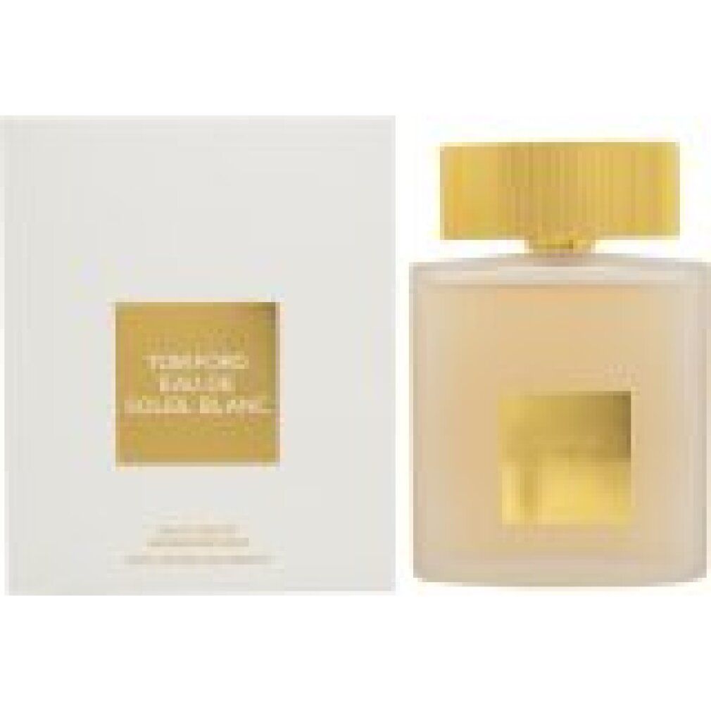 Witte rechthoekige doos en fles. Gouden dop. "Tom Ford Eau de Soleil Blanc" staat op de doos en de fles.