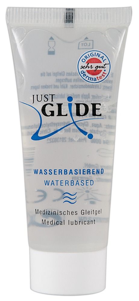 Tube avec inscription: JUST GLIDE, Wasserbasiert, Medizin. Gleitgel. Symbole vagues. Sceau Dermatest.